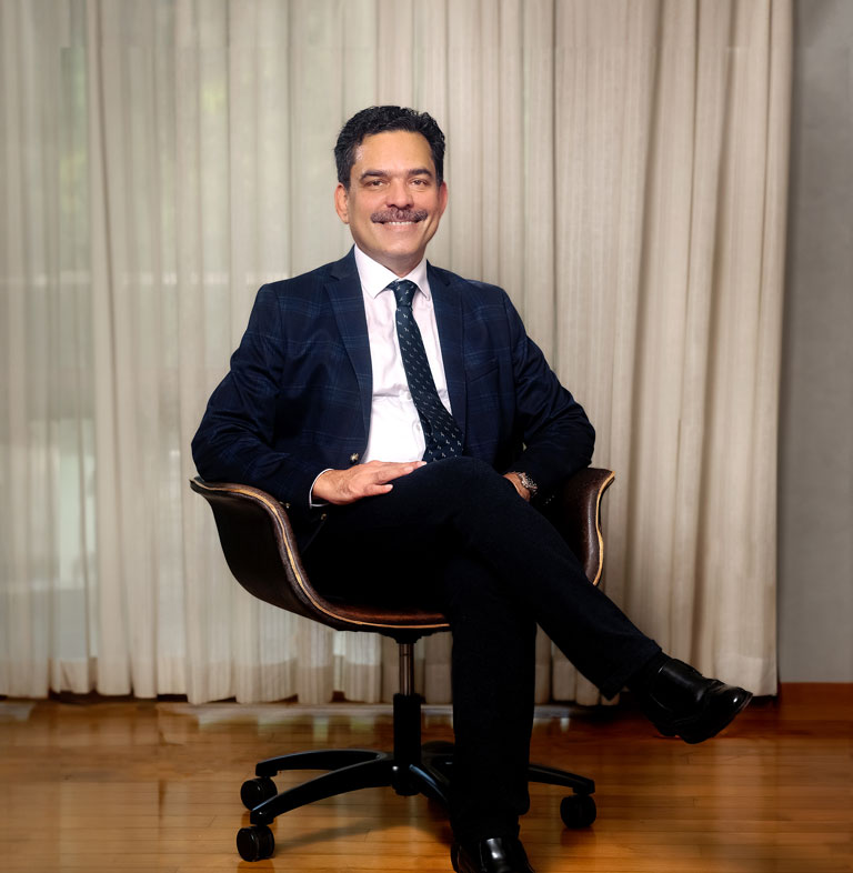 Dr. Navas K M
